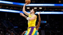 Nov 10, 2025; Charlotte, North Carolina, USA; Los Angeles Lakers forward/guard Luka Doncic (77) floats a shot towards the basket during the first quarter against the Charlotte Hornets at Spectrum Center.