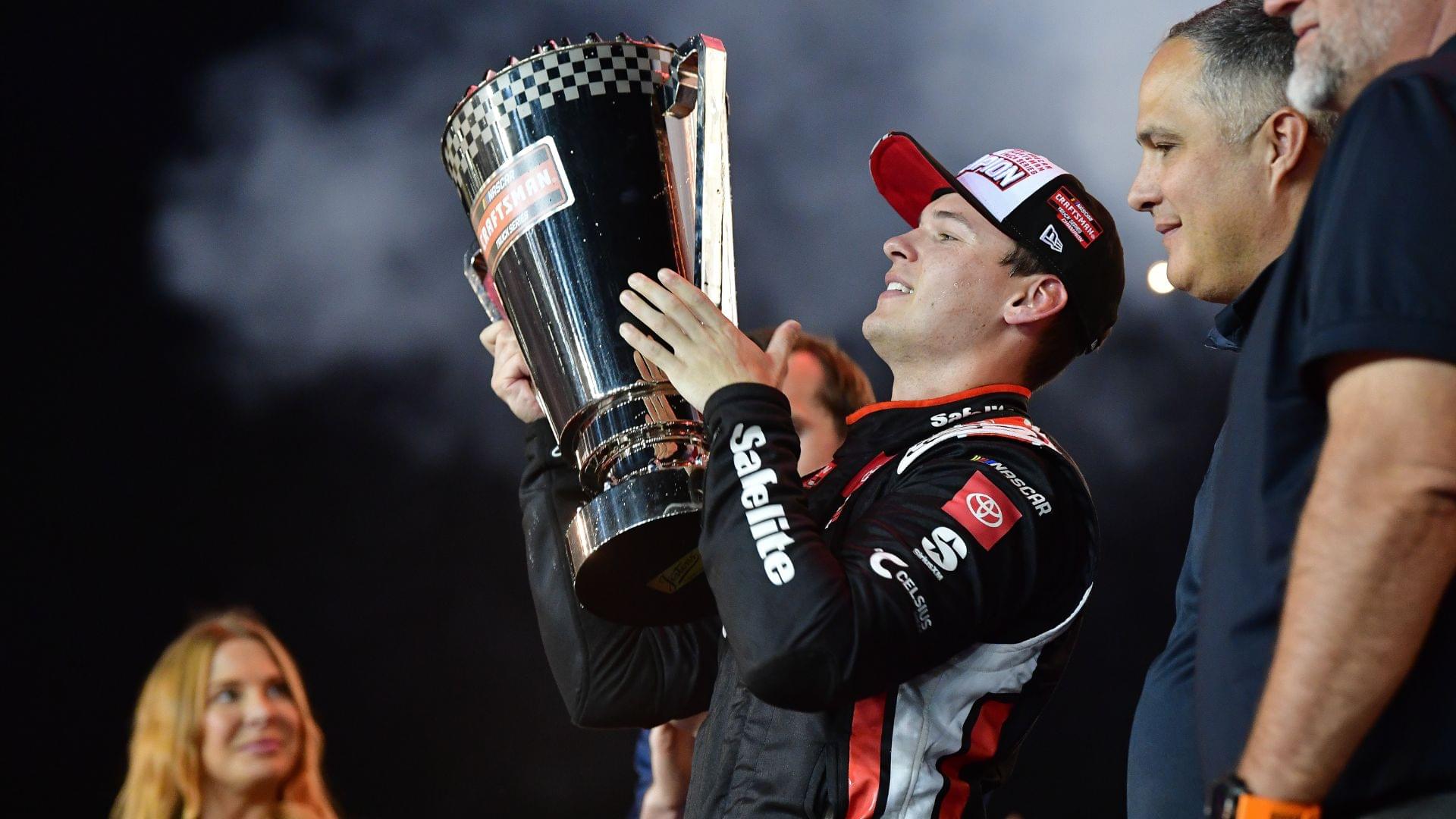 Oct 31, 2025; Avondale, Arizona, USA; NASCAR Gander RV and Outdoors Truck Series driver Corey Heim (11) celebrates his victory following the Truck Series Championship race at Phoenix Raceway.