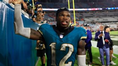 Jacksonville Jaguars wide receiver Travis Hunter (12) high-fives fans after the game of an NFL football matchup at EverBank Stadium, Monday, Oct. 6, 2025, in Jacksonville, Fla. The Jacksonville Jaguars edged the Kansas City Chiefs 31-28. [Corey Perrine/Florida Times-Union]