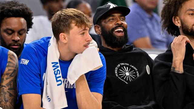 Dallas Mavericks forward Cooper Flagg (left) and guard Kyrie Irving (right) look on during the game between the Dallas Mavericks and the Oklahoma City Thunder at Dickie's Arena.