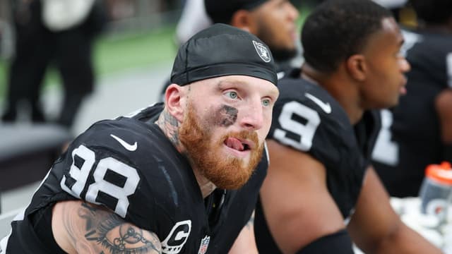 Las Vegas Raiders defensive end Maxx Crosby (98) looks on from the sideline during the first quarter against the Chicago Bears at Allegiant Stadium.