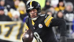Pittsburgh Steelers quarterback Aaron Rodgers (8) looks to pass during the second quarter against the Buffalo Bills at Acrisure Stadium.