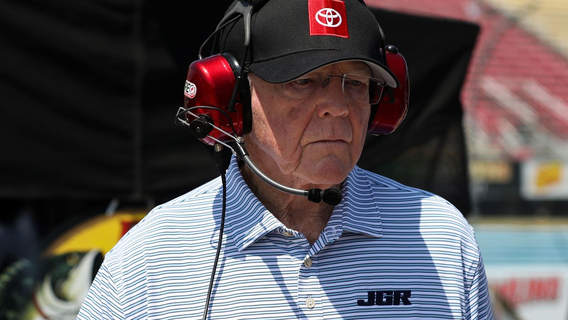 Aug 9, 2025; Watkins Glen, New York, USA; NASCAR Cup Series owner Joe Gibbs looks on from pit road during practice and qualifying for the Go Bowling at The Glen at Watkins Glen International