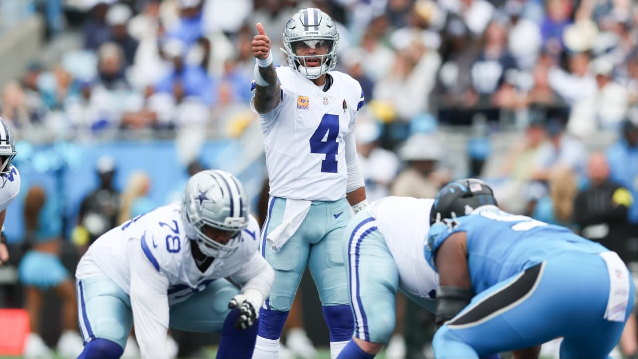 Dallas Cowboys quarterback Dak Prescott (4) communicates before the start of a play against the Carolina Panthers in the second quarter at Bank of America Stadium before the playoffs.