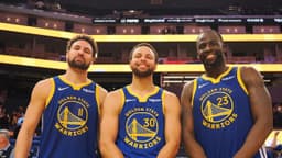 Golden State Warriors guard Klay Thompson (11), guard Stephen Curry (30) and forward Draymond Green (23) after the game against the Los Angeles Clippers at Chase Center.