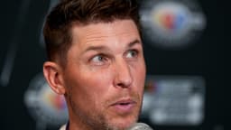 Aug 31, 2023; Charlotte, North Carolina, USA; Denny Hamlin answers questions from the media at Charlotte Convention Center.