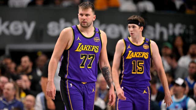 Los Angeles Lakers guard Luka Doncic (77) and guard Austin Reaves (15) during the game between the Dallas Mavericks and the Los Angeles Lakers at American Airlines Center