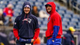 Buffalo Bills quarterback Josh Allen (17) and New England Patriots quarterback Drake Maye (10) talk on the field before the start of the game at Gillette Stadium