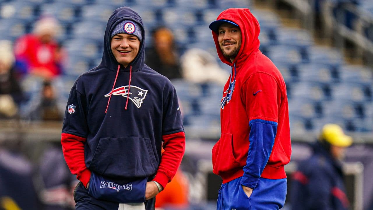 Buffalo Bills quarterback Josh Allen (17) and New England Patriots quarterback Drake Maye (10) talk on the field before the start of the game at Gillette Stadium