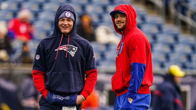 Buffalo Bills quarterback Josh Allen (17) and New England Patriots quarterback Drake Maye (10) talk on the field before the start of the game at Gillette Stadium