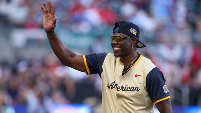 NFL Hall of Fame wide receiver Terrell Owens of the American League shows emotion during the 2025 All Star Celebrity Softball Game at Truist Park.