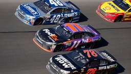 Feb 22, 2015; Daytona Beach, FL, USA; NASCAR Sprint Cup Series drivers Jimmie Johnson (48), Denny Hamlin (11) and Martin Truex Jr. during the Daytona 500 at Daytona International Speedway.