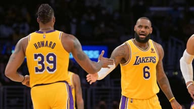 Jan 17, 2022; Los Angeles, California, USA; Los Angeles Lakers center Dwight Howard (39) is met by Los Angeles Lakers forward LeBron James (6) in the first half of the game against the Utah Jazz at Crypto.com Arena