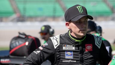 Sep 27, 2025; Kansas City, Kansas, USA; Tyler Reddick before NASCAR Cup Series qualifying at Kansas Speedway.
