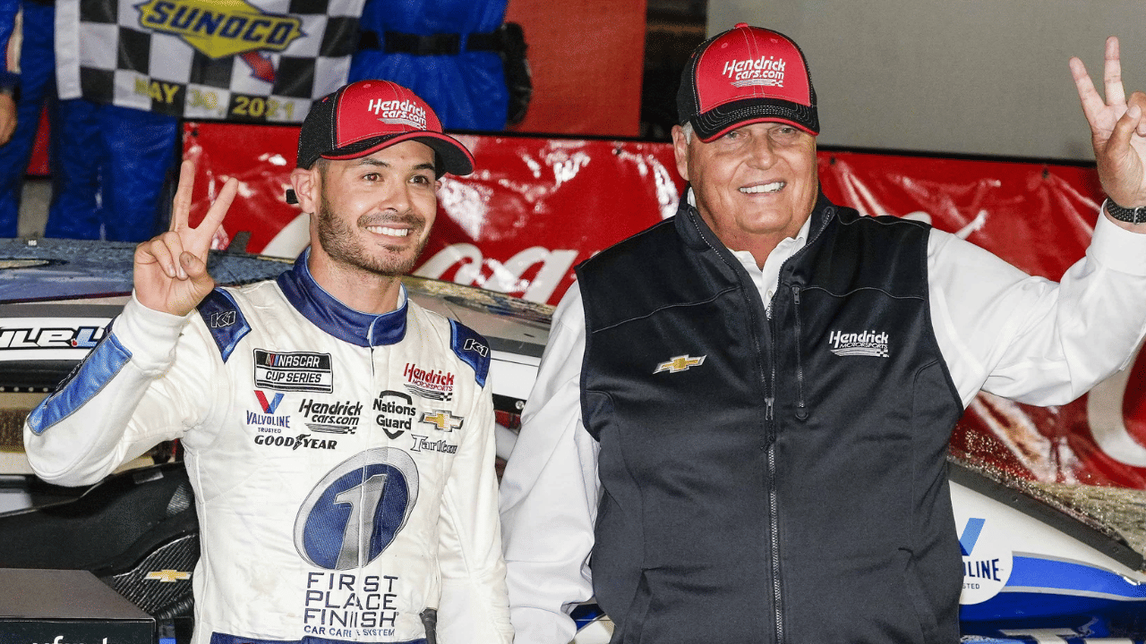 May 30, 2021; Concord, North Carolina, USA; NASCAR Cup Series driver Kyle Larson (5) celebrates his win with team owner Rick Hendrick at the Coca-Cola 600 at Charlotte Motor Speedway. Mandatory Credit: Jim Dedmon-Imagn Images