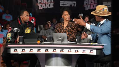 (Left to right) Stephen A. Smith, Amina Smith and Cam Newton discuss topics during ESPN's live broadcast of First Take at Memorial Hall at Delaware State University on October 29, 2025.