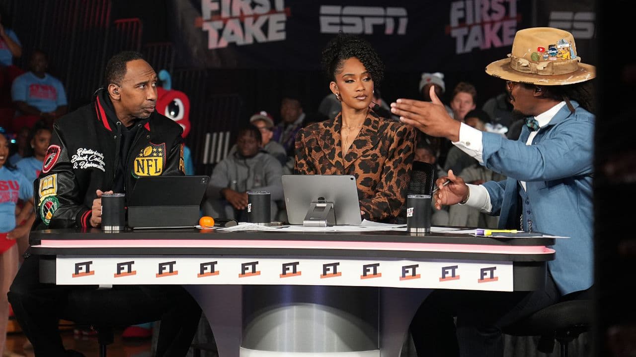 (Left to right) Stephen A. Smith, Amina Smith and Cam Newton discuss topics during ESPN's live broadcast of First Take at Memorial Hall at Delaware State University on October 29, 2025.