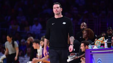 Dec 25, 2025; Los Angeles, California, USA; Los Angeles Lakers head coach JJ Redick watches game action against the Houston Rockets during the first half at Crypto.com Arena.