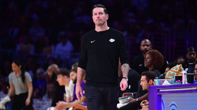 Dec 25, 2025; Los Angeles, California, USA; Los Angeles Lakers head coach JJ Redick watches game action against the Houston Rockets during the first half at Crypto.com Arena.