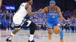 May 22, 2025; Oklahoma City, Oklahoma, USA; Oklahoma City Thunder guard Shai Gilgeous-Alexander (2) drives against Minnesota Timberwolves guard Anthony Edwards (5) in the first quarter during game two of the western conference finals for the 2025 NBA Playoffs at Paycom Center