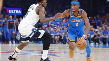 May 22, 2025; Oklahoma City, Oklahoma, USA; Oklahoma City Thunder guard Shai Gilgeous-Alexander (2) drives against Minnesota Timberwolves guard Anthony Edwards (5) in the first quarter during game two of the western conference finals for the 2025 NBA Playoffs at Paycom Center