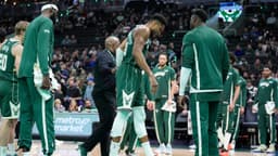 Dec 3, 2025; Milwaukee, Wisconsin, USA; Milwaukee Bucks forward Giannis Antetokounmpo (34) grimaces as he limps off the court after going down with an injury in the first half against the Detroit Pistons at Fiserv Forum. Mandatory Credit: Michael McLoone-Imagn Images
