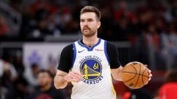 Golden State Warriors guard Pat Spencer (61) brings the ball up court against the Chicago Bulls during the second half at United Center.