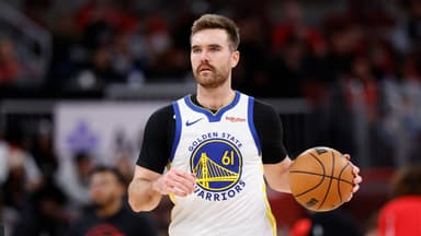 Golden State Warriors guard Pat Spencer (61) brings the ball up court against the Chicago Bulls during the second half at United Center.