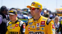 Mar 20, 2022; Hampton, Georgia, USA; NASCAR Cup Series driver Kyle Busch (right) with Christopher Bell during the Folds of Honor QuikTrip 500 at Atlanta Motor Speedway