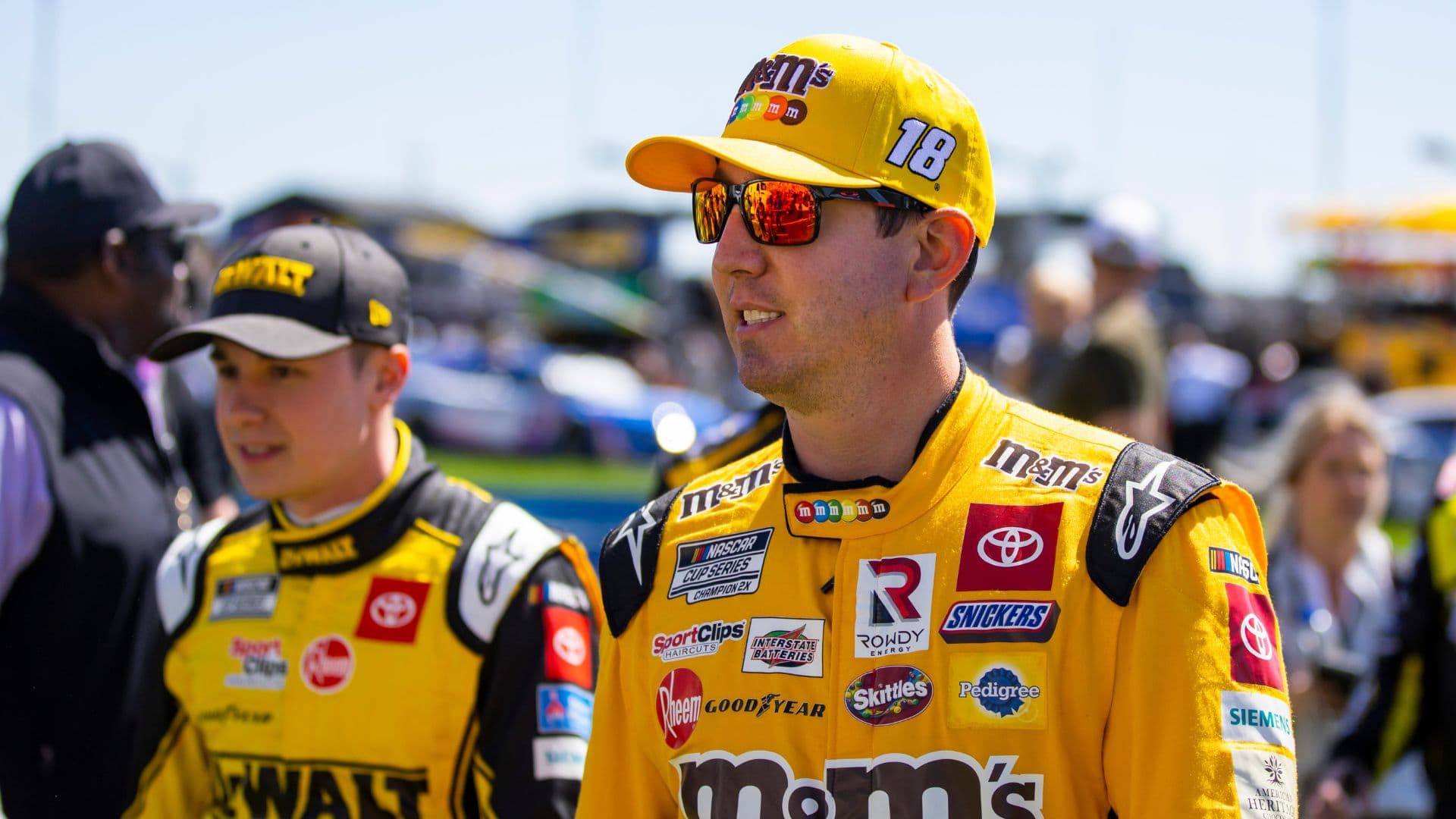 Mar 20, 2022; Hampton, Georgia, USA; NASCAR Cup Series driver Kyle Busch (right) with Christopher Bell during the Folds of Honor QuikTrip 500 at Atlanta Motor Speedway