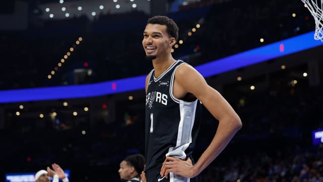 Dec 25, 2025; Oklahoma City, Oklahoma, USA; San Antonio Spurs forward Victor Wembanyama (1) smiles after a play against the Oklahoma City Thunder during the second half at Paycom Center.