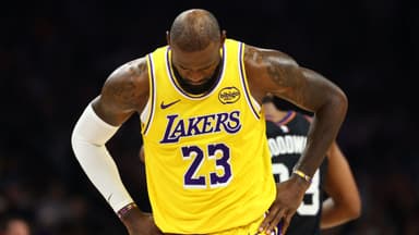 Dec 23, 2025; Phoenix, Arizona, USA; Los Angeles Lakers forward LeBron James (23) reacts against the Phoenix Suns at Mortgage Matchup Center.