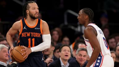 Feb 26, 2025; New York, New York, USA; New York Knicks guard Jalen Brunson (11) looks to in bound the ball against Philadelphia 76ers guard Tyrese Maxey (0) during the fourth quarter at Madison Square Garden