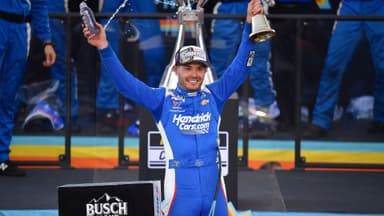 Nov 2, 2025; Avondale, Arizona, USA; NASCAR Cup Series driver Kyle Larson (5) celebrates his championship victory following the Cup Series Championship race at Phoenix Raceway.