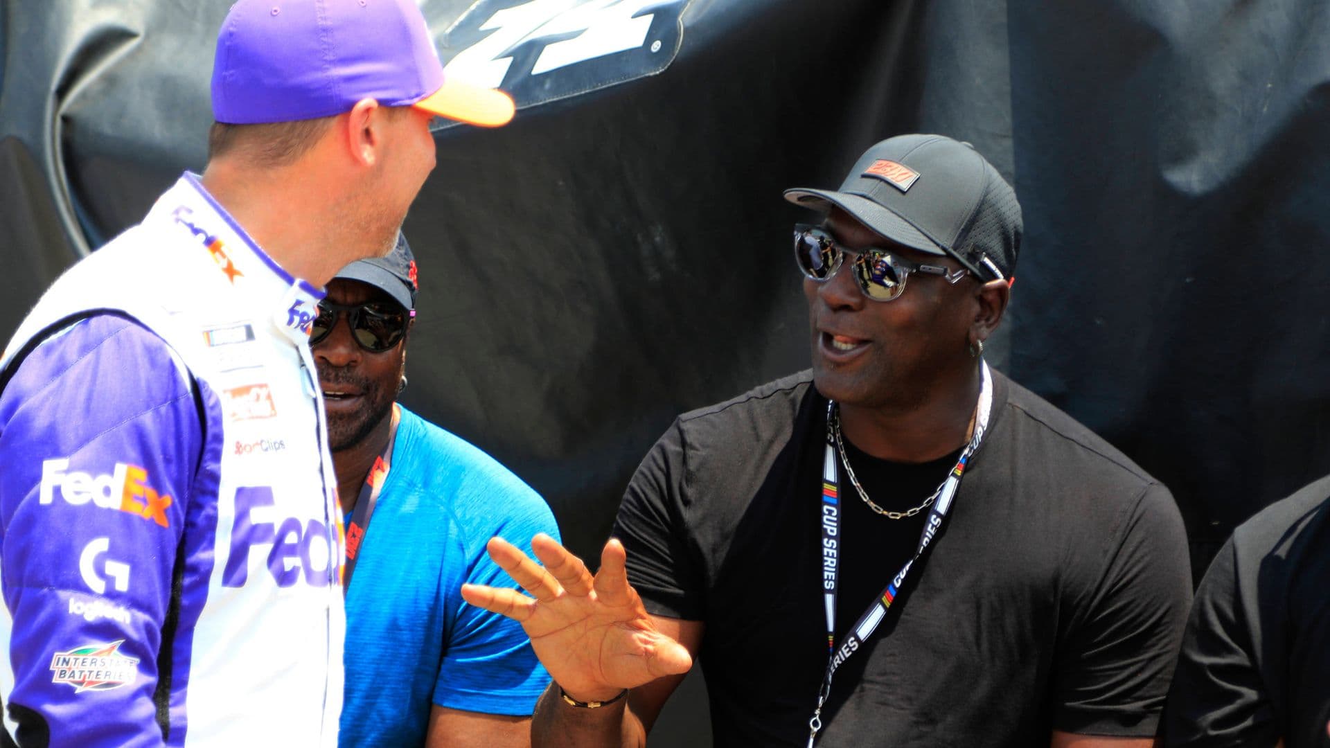 23Xi co-owner Michael Jordan talks with Denny Hamlin ( 11 Joe Gibbs Racing FedEx Ground Toyota) during qualifying for the NASCAR, Motorsport, USA Cup Series Ally 400 on June 24, 2023