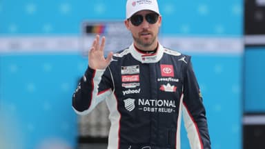 DAYTONA BEACH, FL - FEBRUARY 16: Denny Hamlin ( 11 Joe Gibbs Racing National Debt Relief Toyota) waves to the fans prior to the running of the NASCAR, Motorsport, USA Cup Series Daytona 500 on February 16, 2025 at Daytona International Speedway in Daytona Beach, FL