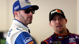 Feb 12, 2016; Daytona Beach, FL, USA; NASCAR Sprint Cup Series driver Jimmie Johnson (48) talks with NASCAR Sprint Cup Series driver Denny Hamlin (11) during practice for the Sprint Unlimited at Daytona International Speedway.