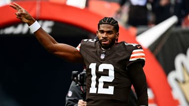 Cleveland Browns quarterback Shedeur Sanders (12) runs on the field before the game against the San Francisco 49ers at Huntington Bank Field.