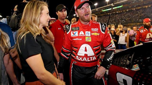 Nov 19, 2017; Homestead, FL, USA; NASCAR Cup Series driver Dale Earnhardt Jr. (88) with his wife Amy Reimann after the Ford EcoBoost 400 at Homestead-Miami Speedway.