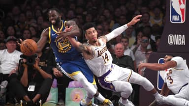 Oct 16, 2019; Los Angeles, CA, USA; Golden State Warriors forward Draymond Green (23) and Los Angeles Lakers guard Danny Green (14) battle for the ball in the first half at Staples Center