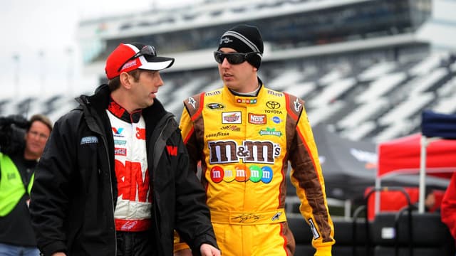 Feb 13, 2010; Daytona Beach, FL, USA; NASCAR Sprint Cup Series driver Greg Biffle (16) talks with Kyle Busch during practice for the Daytona 500 at Daytona International Speedway.