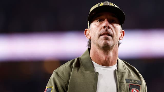San Francisco 49ers head coach Kyle Shanahan walk off the field after defeating the Carolina Panthers at Levi's Stadium.