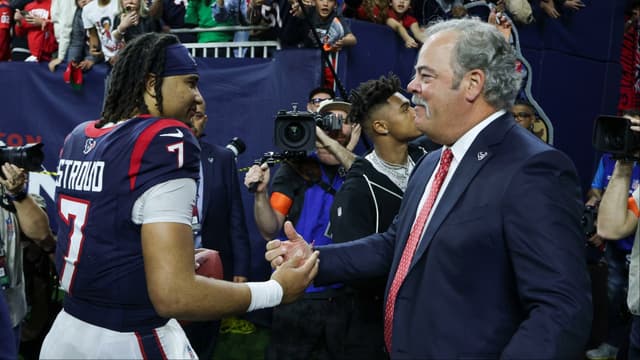 Houston Texans chief executive officer Cal McNair (right) greets quarterback C.J. Stroud (7) after a 2024 AFC wild card game against the Cleveland Browns at NRG Stadium.