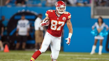 Kansas City Chiefs tight end Travis Kelce (87) runs after catching a pass during the third quarter against the Carolina Panthers at Bank of America Stadium.