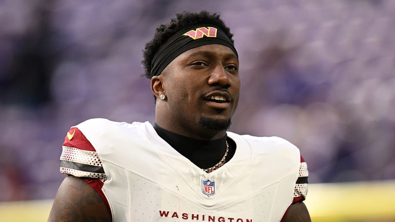 Washington Commanders wide receiver Deebo Samuel Sr. (1) practices before the game at U.S. Bank Stadium.
