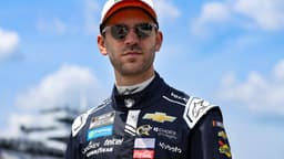 Jun 21, 2025; Long Pond, Pennsylvania, USA; NASCAR Cup Series driver Daniel Suarez walks on pit road during practice and qualifying for The Great American Getaway 400 at Pocono Raceway