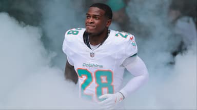 Miami Dolphins running back De'Von Achane (28) takes the field prior to a game against the New Orleans Saints at Hard Rock Stadium.