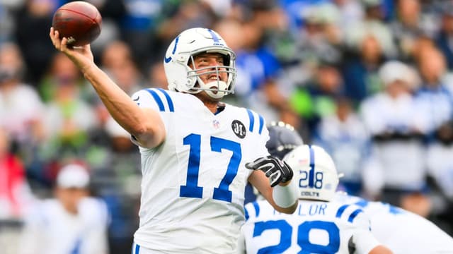 Indianapolis Colts quarterback Philip Rivers (17) passes against the Seattle Seahawks during the first quarter at Lumen Field.