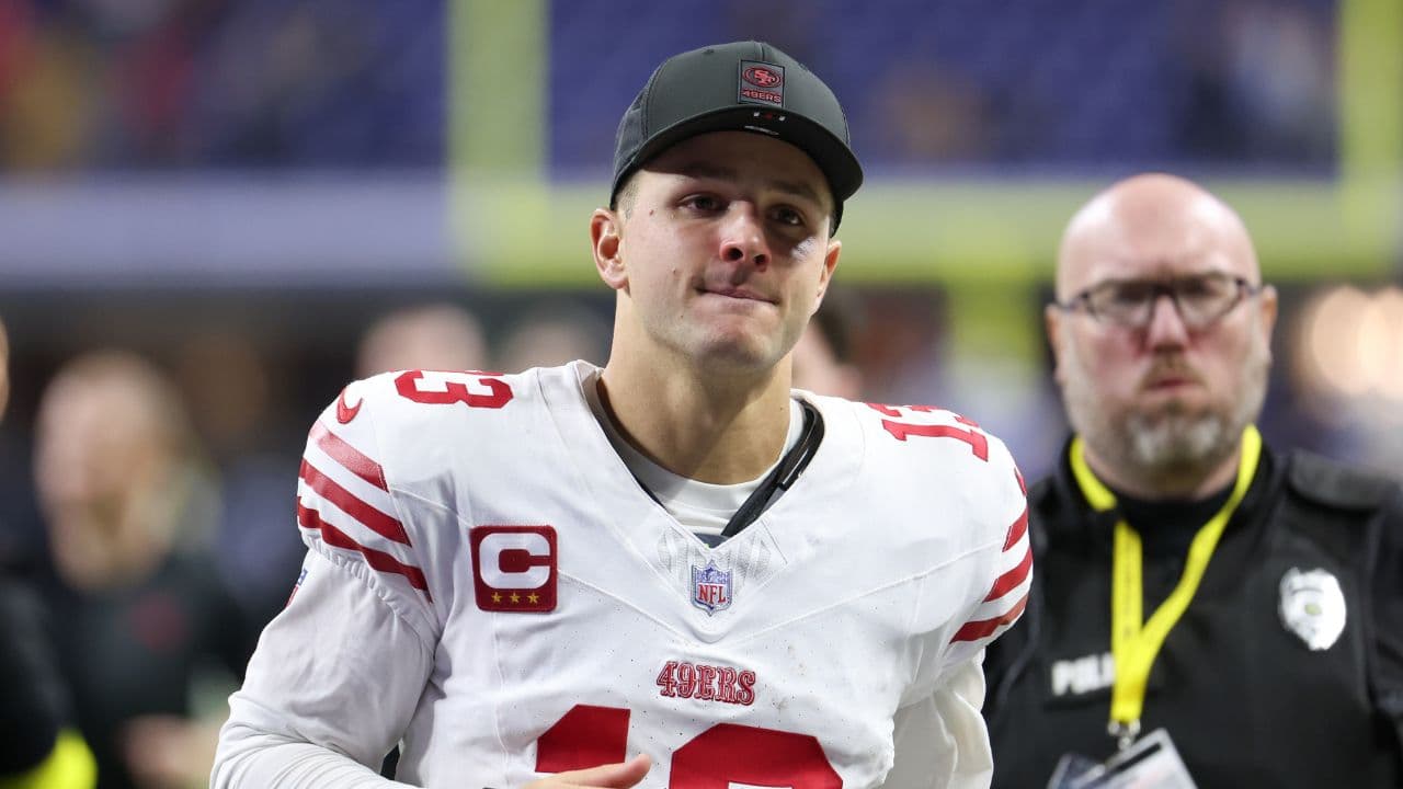 San Francisco 49ers quarterback Brock Purdy (13) leaves the field after the game against the Indianapolis Colts at Lucas Oil Stadium.
