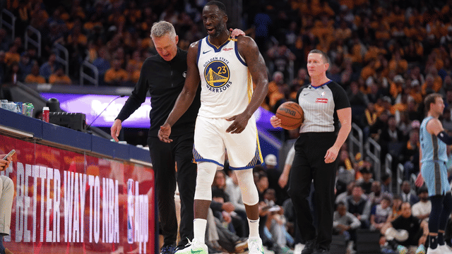 Apr 15, 2025; San Francisco, California, USA; Golden State Warriors forward Draymond Green (23) walks towards the team bench with head coach Steve Kerr after a play against the Memphis Grizzlies in the third quarter at the Chase Center.